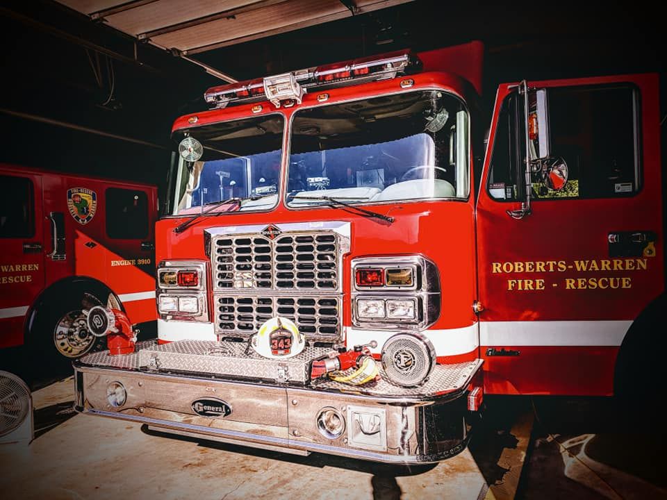 Roberts-Warren Fire-Rescue engine with the 343 memorial helmet honoring firefighters lost on 9/11/2001